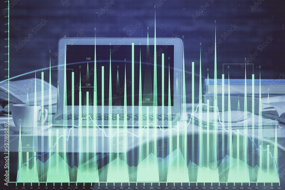 Forex market graph hologram and personal computer on background. Multi exposure. Concept of investment. Forex market graph hologram and personal computer on background. Multi exposure. Concept of investment.
