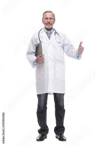A mature doctor holding a clipboard and posing isolated against white background