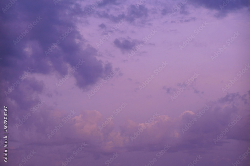 Pink clouds in the sky close-up. Background image.