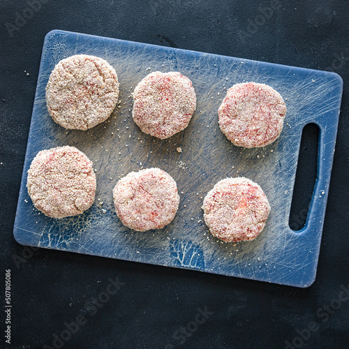 raw cutlet meat pork, beef, lamb, chicken fresh cutlets healthy meal food snack diet on the table copy space food background rustic top view