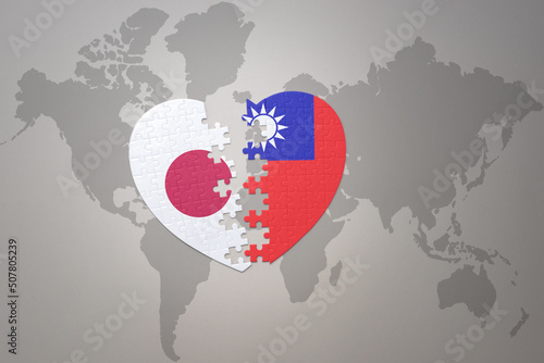 puzzle heart with the national flag of japan and taiwan on a world map background. Concept. 3D illustration