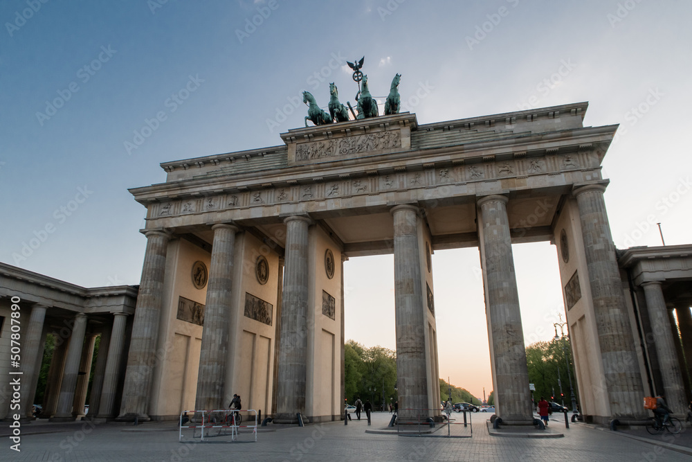 brandenburg gate without people at sunset