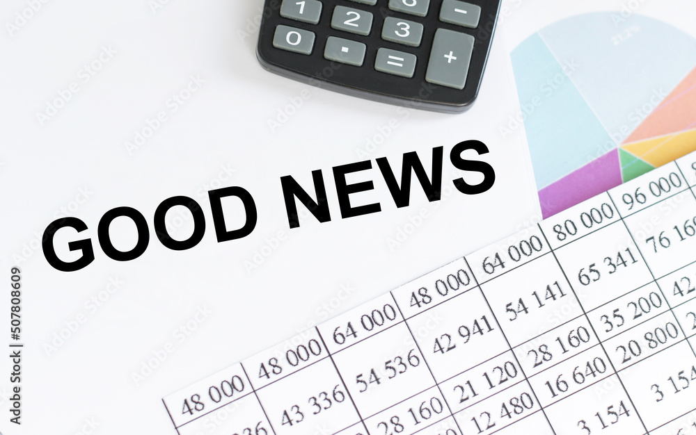 Good news inscription on a notebook on the table, a business concept Good news inscription on a notebook on the table, a business concept