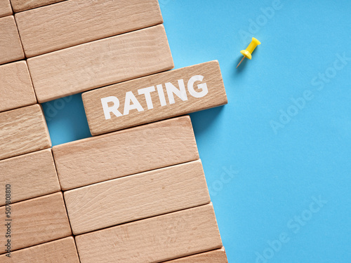 The word rating written on wooden blocks. Evaluation, service quality or client satisfaction