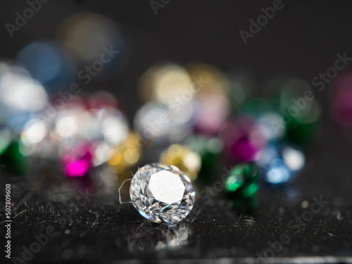 Close up shot of group multi colors diamond on a black background