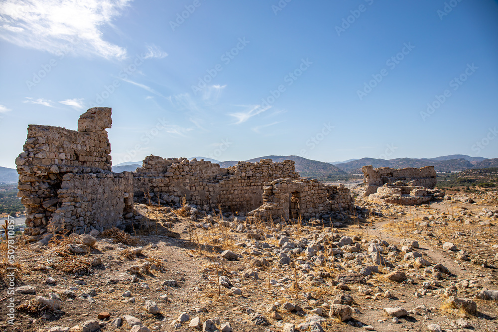Ruined Feraklos castle overlooking Charaki, Rhodes island, Greece	