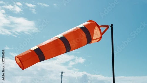 windsock with blue sky on background  photo