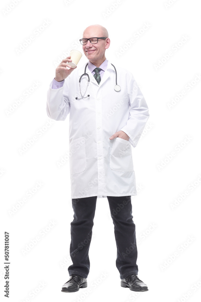 smiling doctor with a takeaway coffee. isolated on a white smiling doctor with a takeaway coffee. isolated on a white