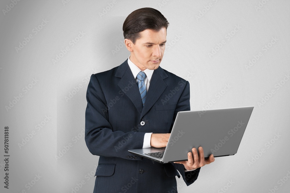 Successful young man student freelancer using laptop, Successful young man student freelancer using laptop,