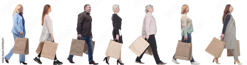 a group of people are running paper shopping bags a group of people are running paper shopping bags