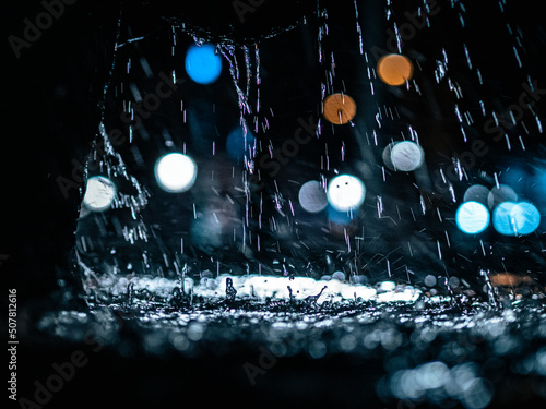 Fototapeta Naklejka Na Ścianę i Meble -  Water dripping in fountain at night
