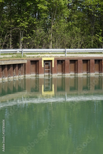 Iron dock at Hildesheim Harbour at the end of Stichkanal Hildesheim (side channel of Mittelland Canal), sunny spring day (vertical), Hildesheim, Lower Saxony, Germany © Jens