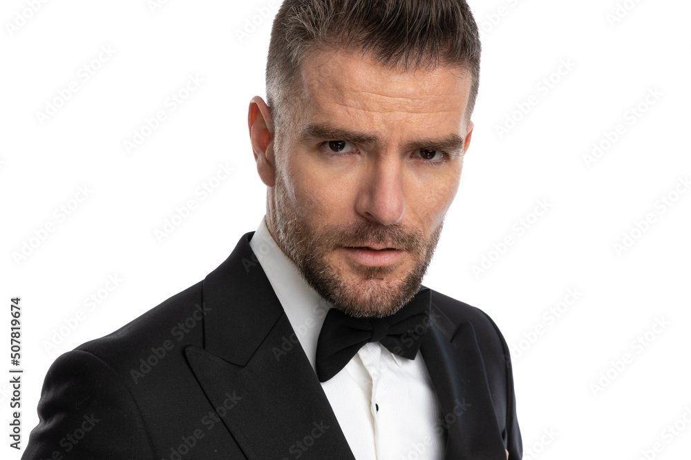 handsome businessman with tough look on his face handsome businessman with tough look on his face