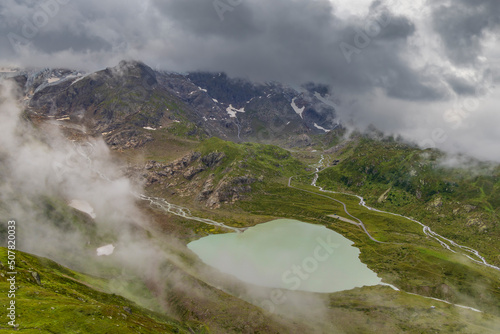 Typical alpine landscape of Swiss Alps with Steinsee, Urner Alps, Canton of Bern, Switzerland