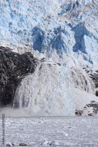 Eqip Sermia glacier calving with a loud ice avalanche (vertical), Eqip Sermia, Greenland photo