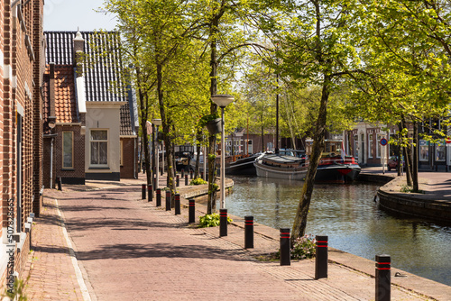 Canal with old houseboats in the center of the town of Meppel in the Netherlands. photo