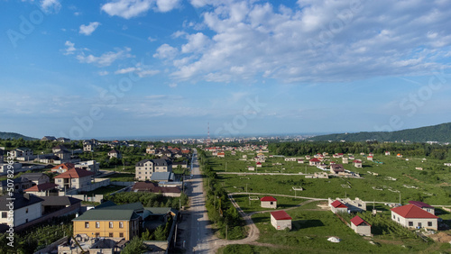 Top view from a drone on a village in summer