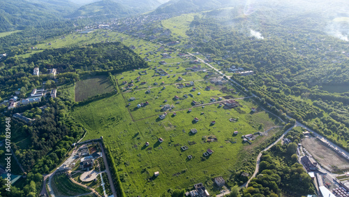Top view from a drone on a village in summer