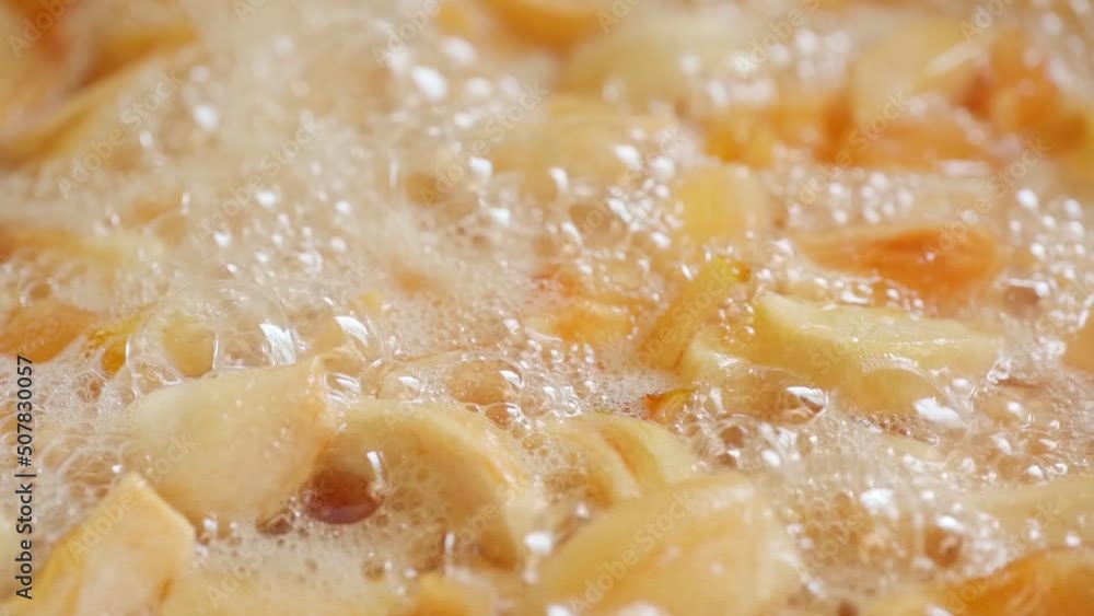 Making quince jam. Quince is cooked to the state of jam Making quince jam. Quince is cooked to the state of jam
