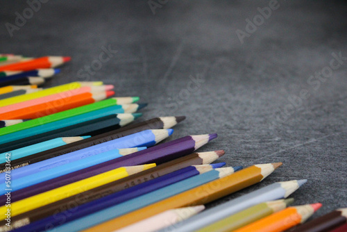pencils on black background