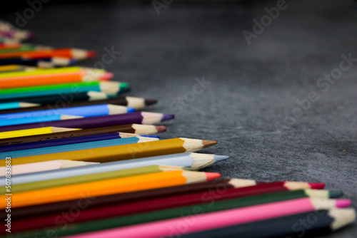 pencils on black background