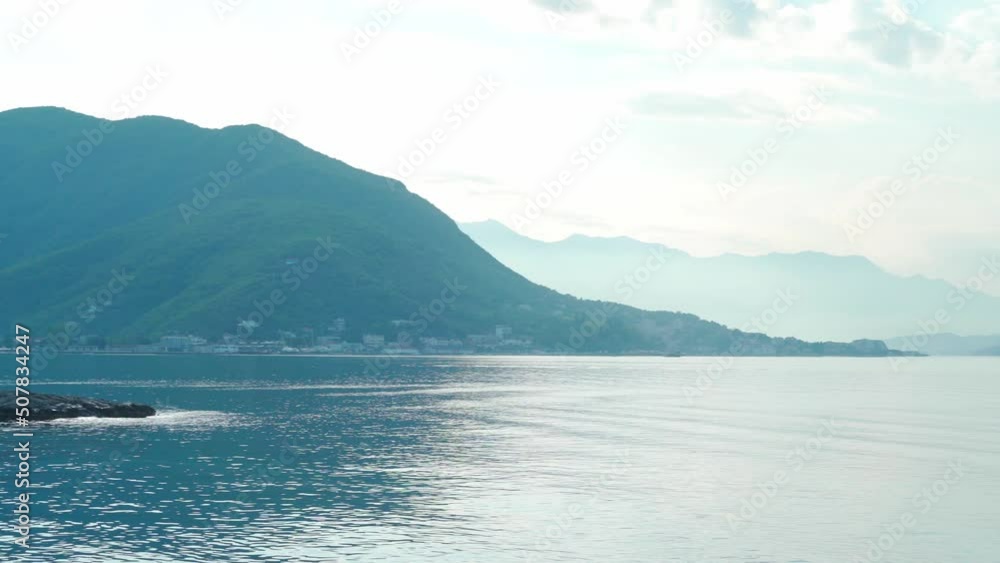 Beautiful view of the sea bay and mountains on a wonderful summer sunny day Beautiful view of the sea bay and mountains on a wonderful summer sunny day