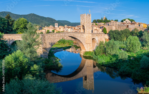 Medieval town with bridge. Besalu, Catalonia, Spain photo