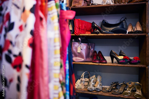 Interior Of Charity Shop Or Thrift Store Selling Used And Sustainable Clothing Shoes And Handbags