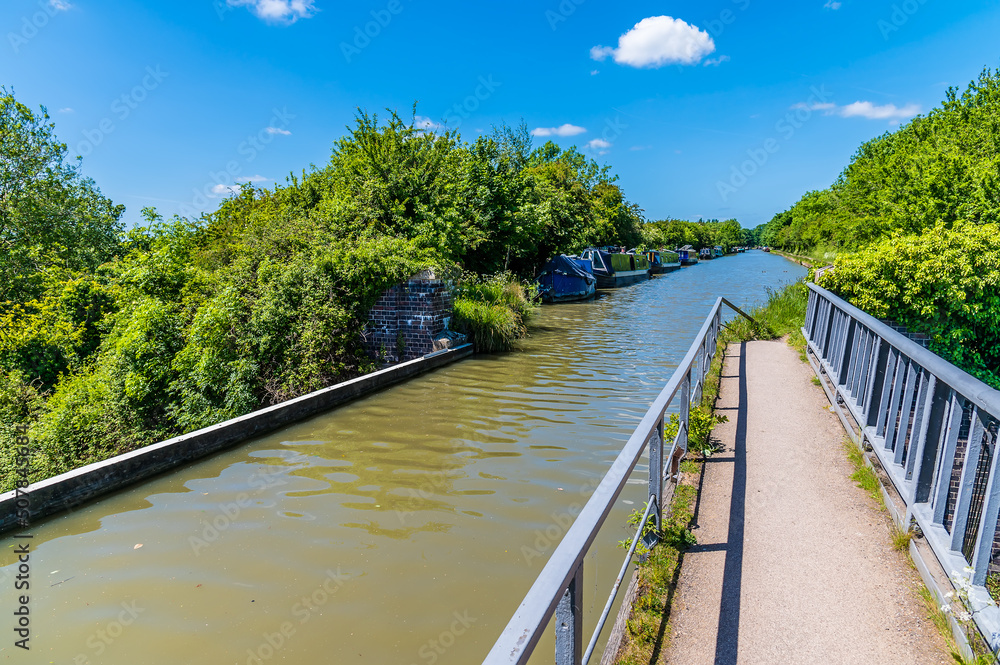 A view along the top of the Iron Trunk aqueduct and the Grand Union canal at Wolverton, UK in summertime
