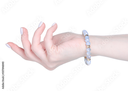 jewelry bracelet stones on female hand on white background isolation