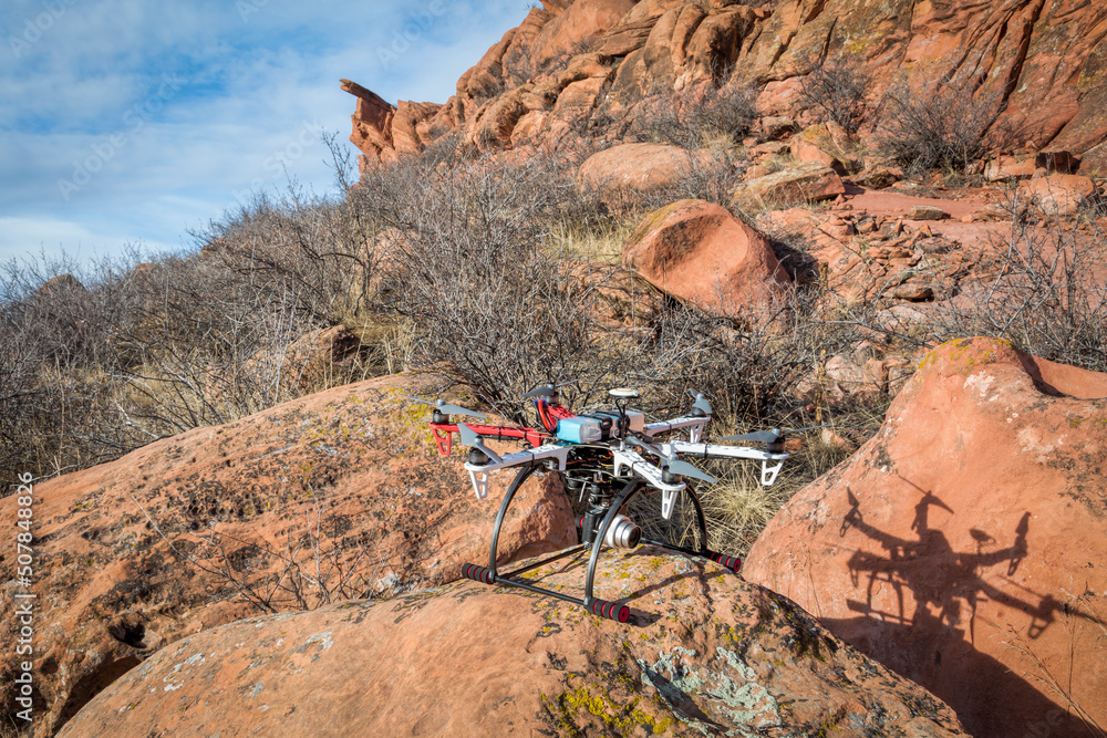 home made hexacopter drone with a small camera in a sandstone canyon ready  to take off Photos | Adobe Stock