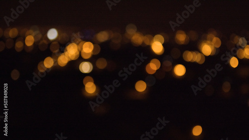 Abstract pattern of dark city light out of focus for background © Arian