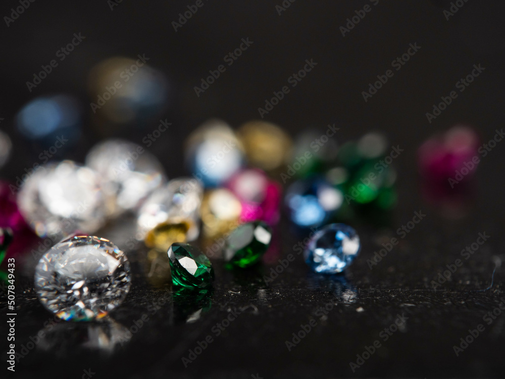 Close up shot of group multi colors diamond on a black background Close up shot of group multi colors diamond on a black background