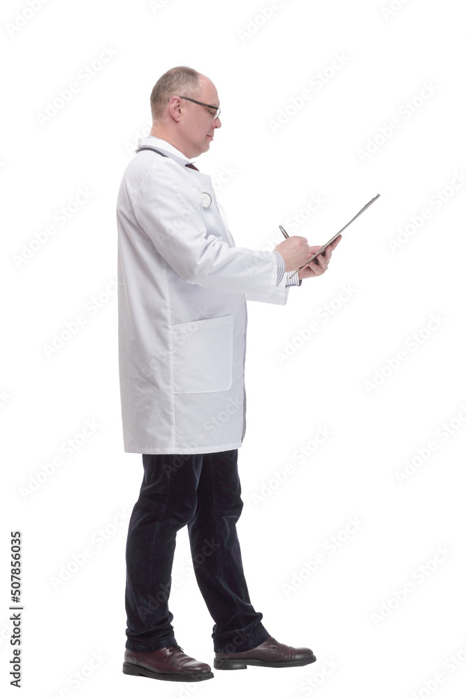 qualified mature doctor with clipboard .isolated on a white background. qualified mature doctor with clipboard .isolated on a white background.