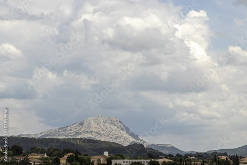 the Sainte Victoire mountain in the light of a cloudy spring afternoon photo