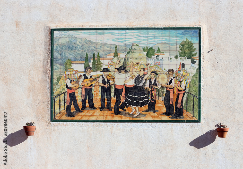 Obraz premium Open air wall decoration with ceramic on Plaza de los Verdiales in the Andalusian white village of Comares, in the province of Malaga