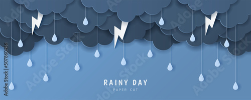 Paper cut of rainy day text with clouds, rain drops and lightning on blue background, copy space. Vector illustration