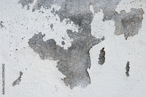 The dilapidated walls and the paint wears off from use for a long time.