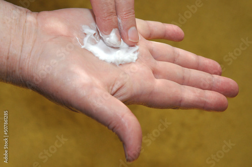 Hand skin care with hand cream photo