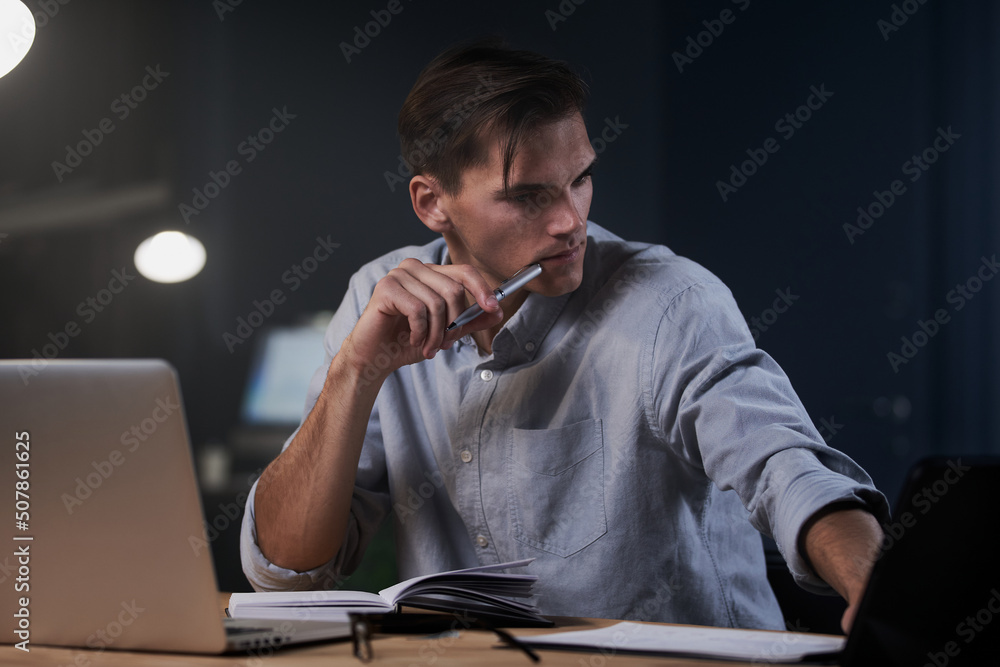 While others are sleeping.man works overtime at night While others are sleeping.man works overtime at night