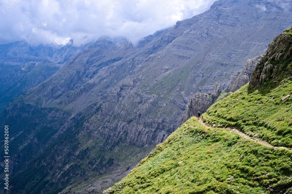 Naklejka premium Hiker on the hiking route on the the cliffs of the Pineta Gorge