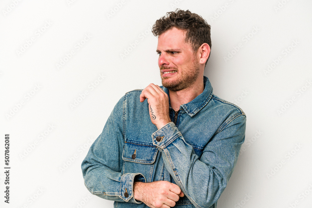 Young caucasian man isolated on white background confused, feels doubtful and unsure. Young caucasian man isolated on white background confused, feels doubtful and unsure.