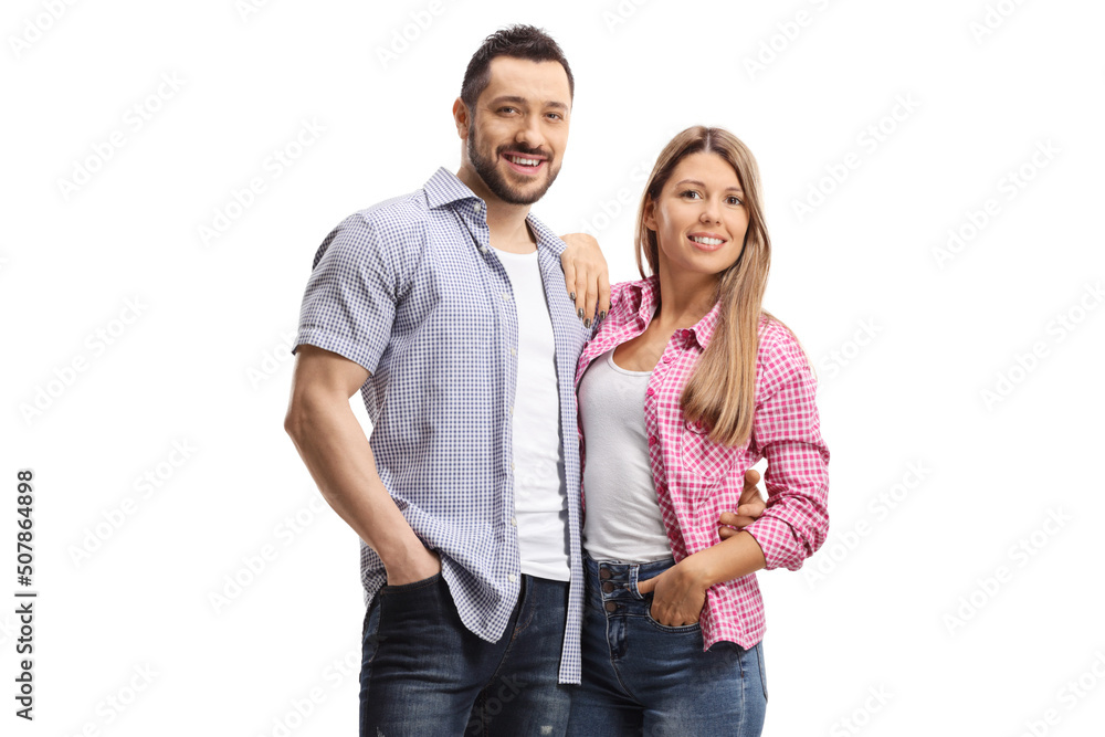 Happy young casual couple posing in embrace Happy young casual couple posing in embrace