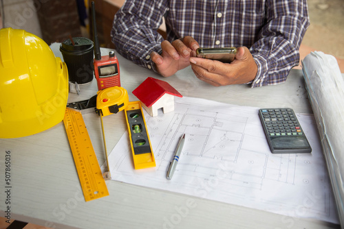 Engineers are searching for information to support the project design. blueprint  at Construction Site