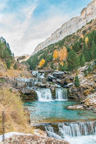 River waterfall. With mountains in background. Pyrenees. Pirineos 