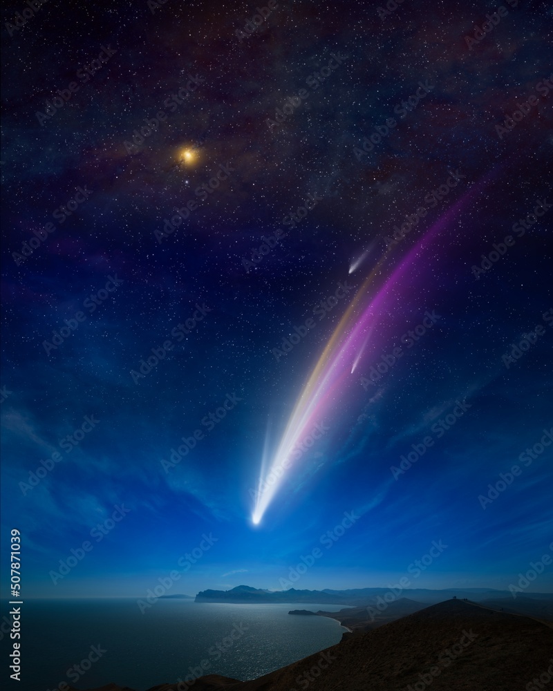Amazing unreal background: giant colorful comet in starry sky over calm sea and mountains. Comet is icy small Solar System body.