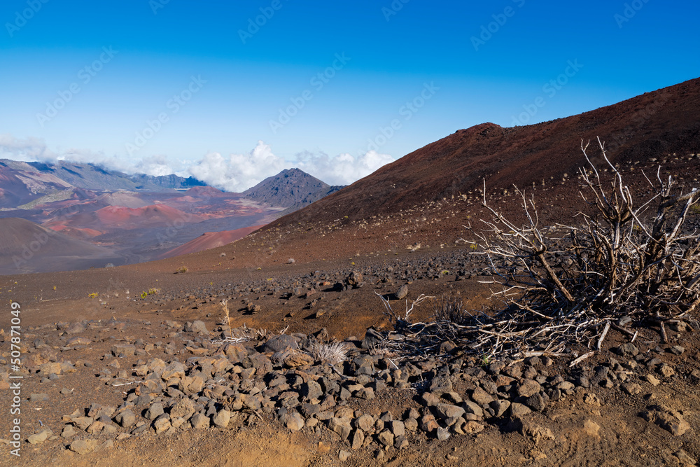 barren slopes and cinder cones on valley floor of haleakala crater maui hawaii barren slopes and cinder cones on valley floor of haleakala crater maui hawaii
