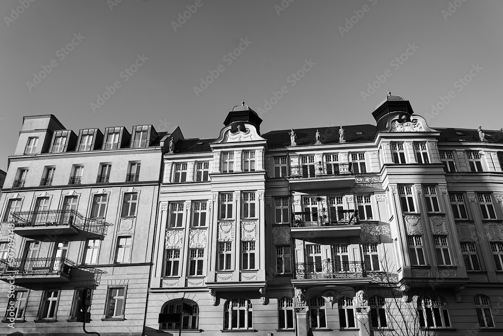 facades of historic tenement houses with balconies in the city of Poznan