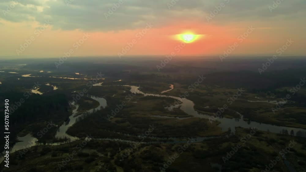 Aerial view of dramatic sunrise sky and landscape with curved river, Beautiful nature panorama Aerial view of dramatic sunrise sky and landscape with curved river, Beautiful nature panorama