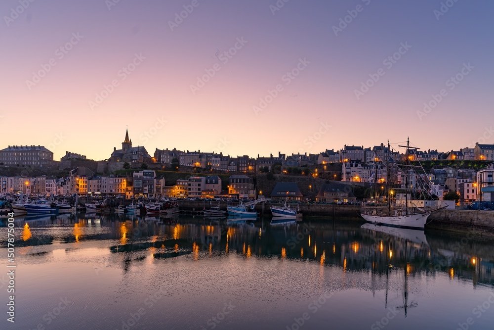 The harbor roadstead of the city of Granville in Europe, France, Normandy, Manche, in spring, at night